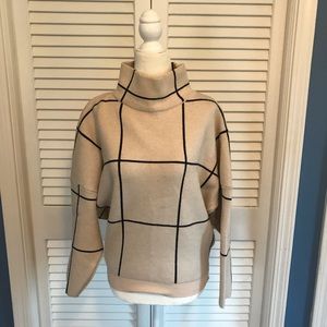 Beige and black grid turtleneck sweater. S-M